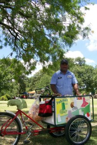 A photo of a paleta (popsicle) vendor in San Pedro Springs Park in San Antonio, Texas.