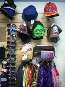 Photo of sunglasses, hats, scarves and purses at Buffalo Exchange.