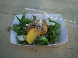 Photo of Romaine lettuce, sliced nectarines, bleu cheese and sunflower seed salad at G&G Mobile Bistro.