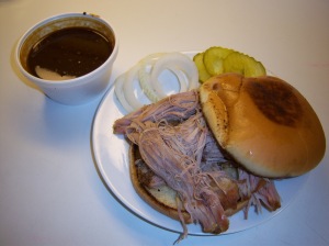 Photo of Augie's Barbed Wire Smokehouse Pulled-Pork Sandwich.